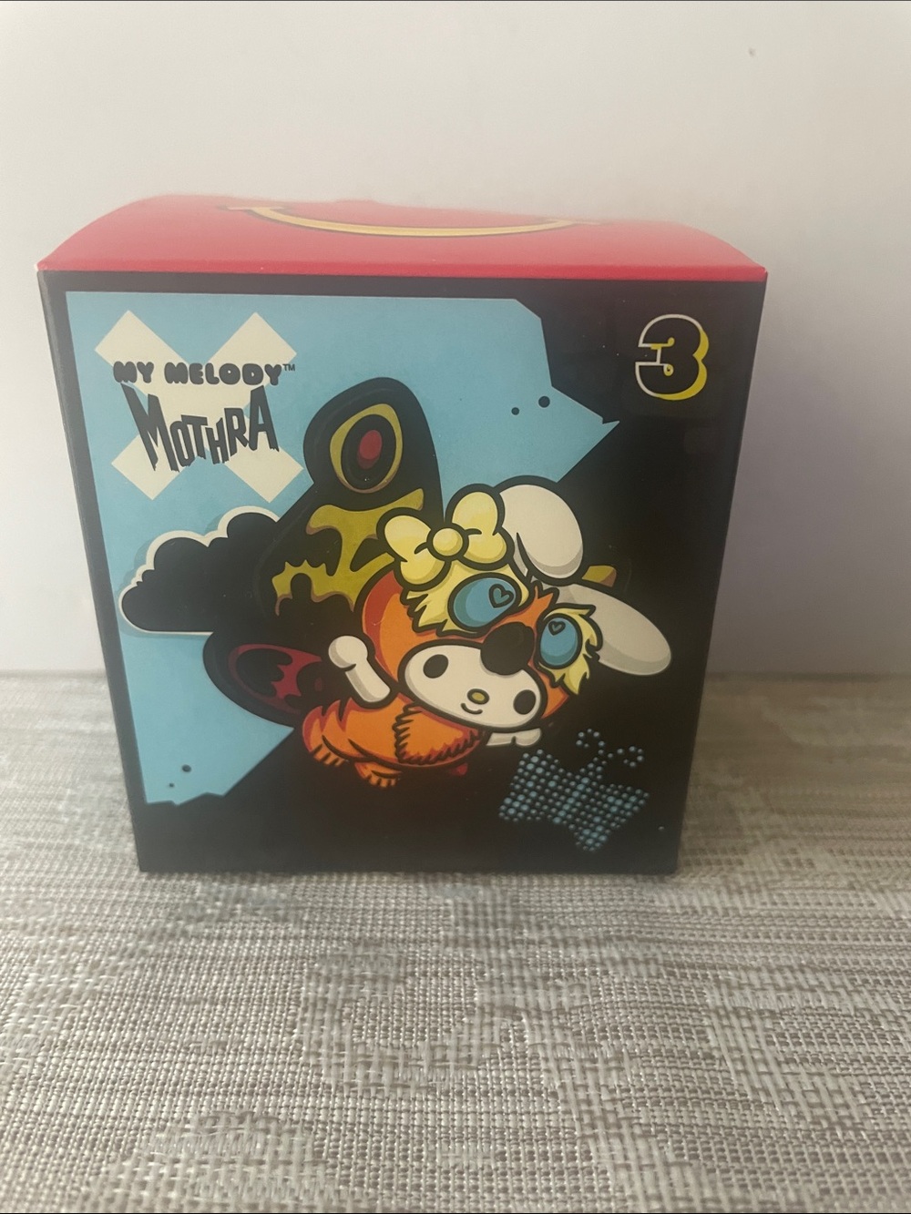 McDonald's My Melody Mothra Figure - Black, Red, Blue & Yellow collectable
